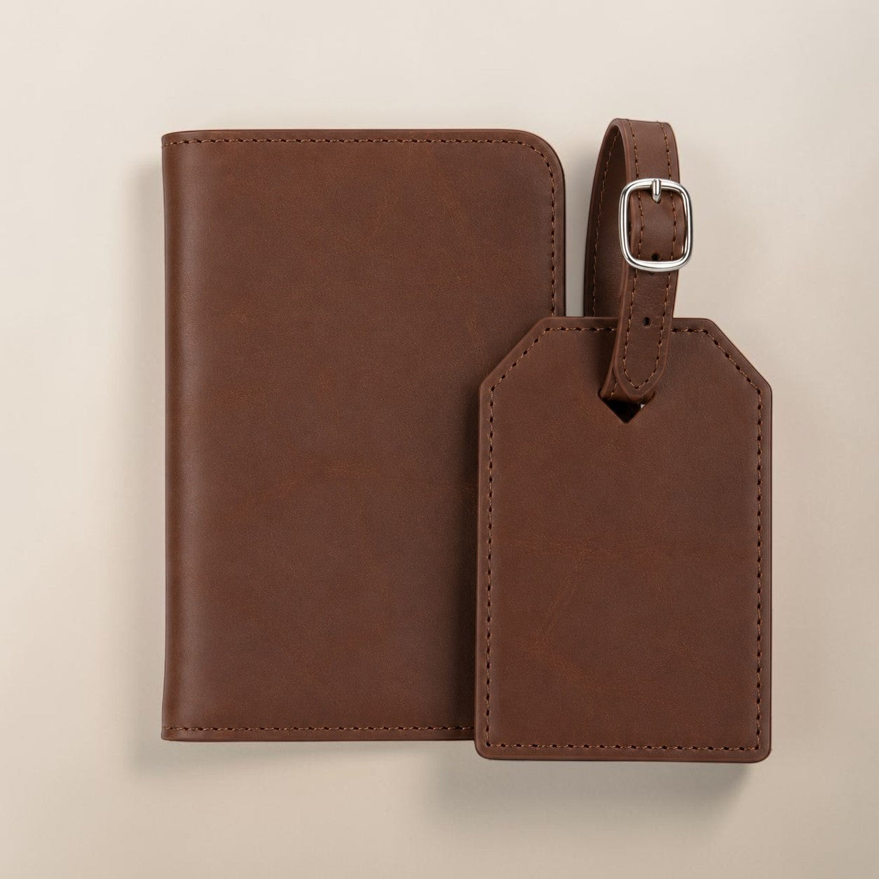 Engravr store display travel gift set featuring a brown leather RFID passport wallet and matching luggage tag.