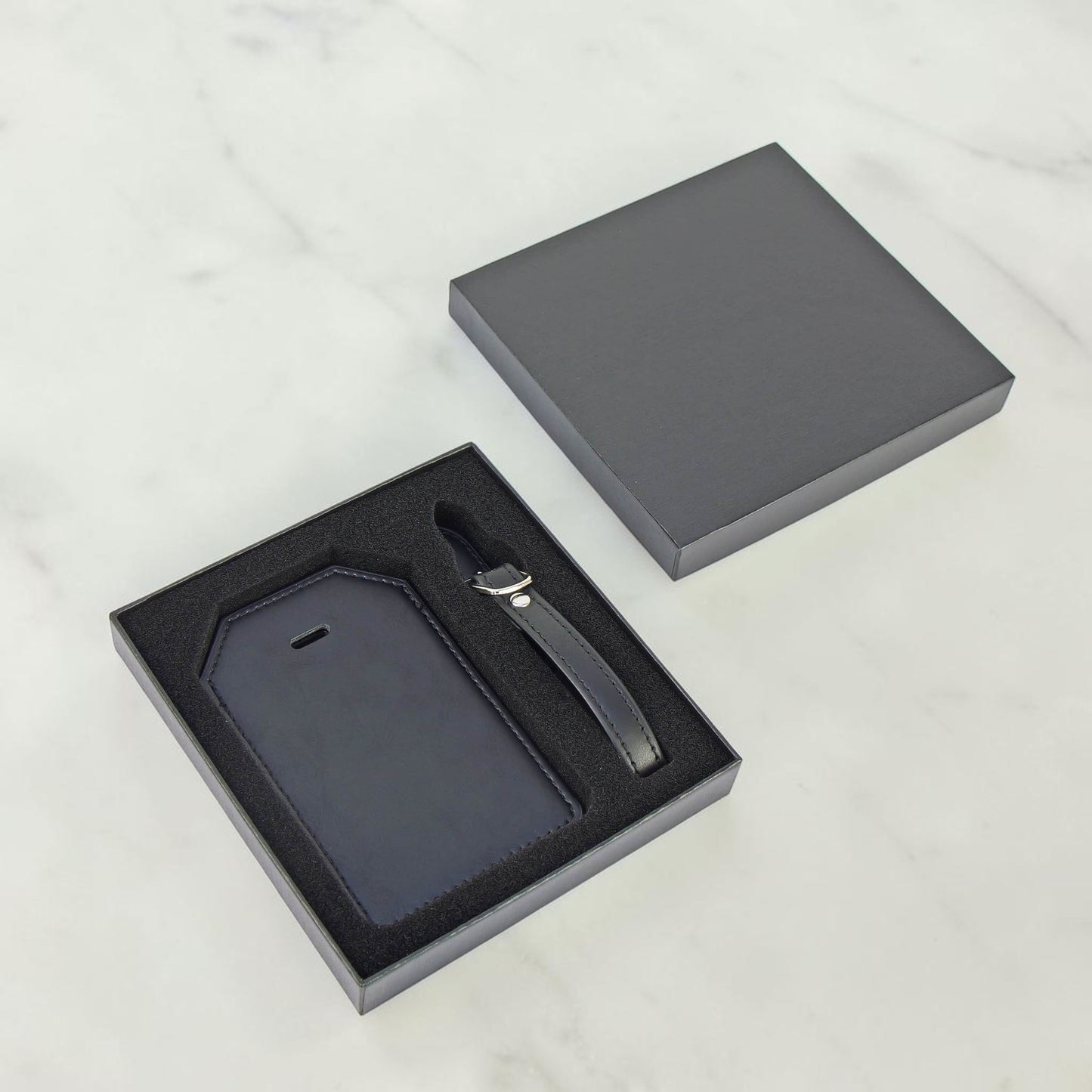 Black personalized luggage tag with custom laser engraving for business trips travel enthusiast gift