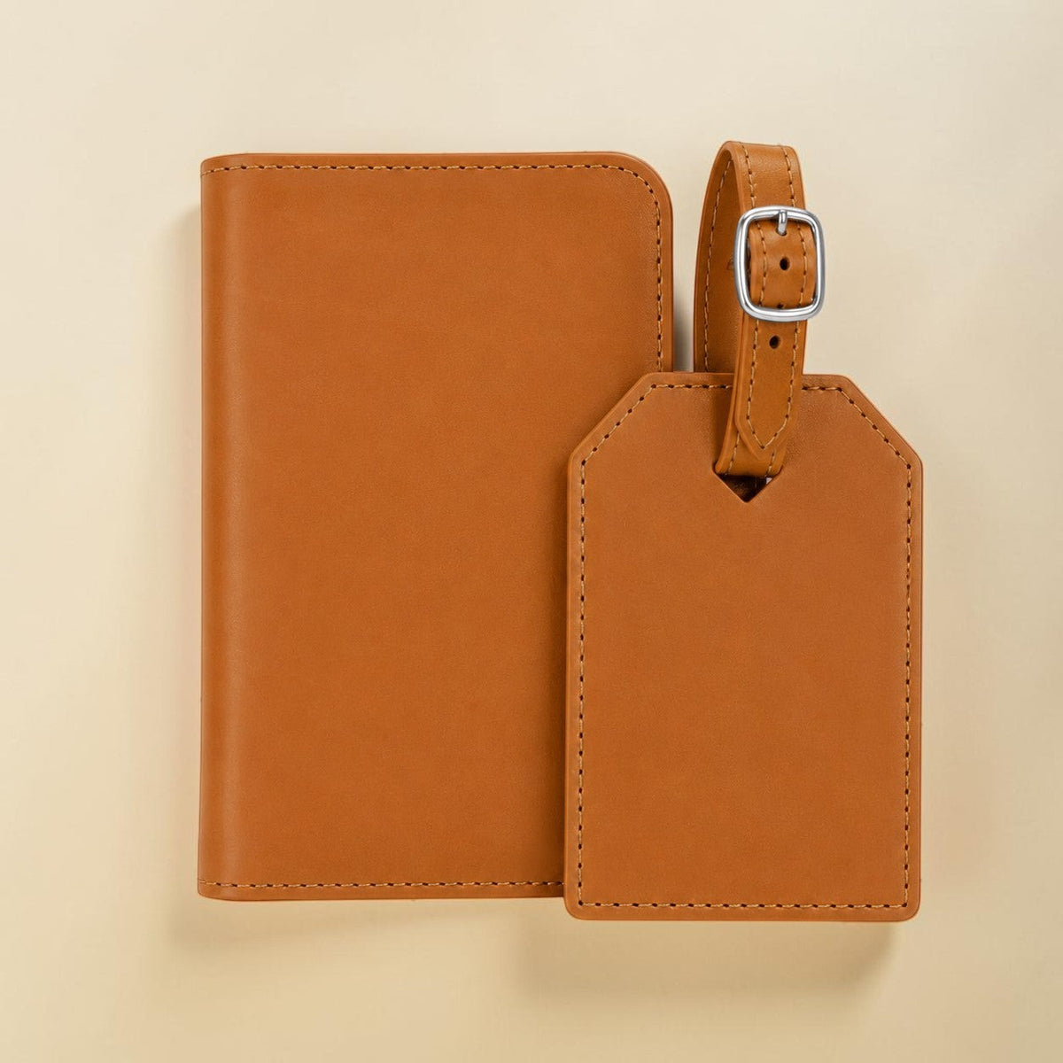 Engravr store display travel gift set featuring a tan leather RFID passport wallet and matching luggage tag.
